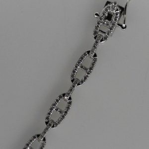 Diamond Bracelets
14 Karat White Diamond Bracelet Length: 7.5in
221 Center Diamonds Shape: Round Clarity: SI1 Colour: G/H 1.877