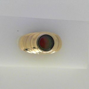 ** Ring
14 Karat Yellow ** Ring With Finger Size 6.25
Width 3.7mm Gram Weight 7.64
1 Center ** Shape: Round