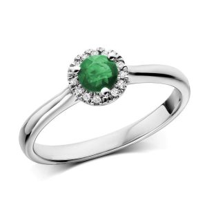 Emerald Ring 
14 Karat White Emerald Ring With Finger Size 6.75 
Width 2.4mm Gram Weight 2.9 
1 Center Emerald 0.41ct Shape: Round With 15 Round Diamonds 0.11 ctw
