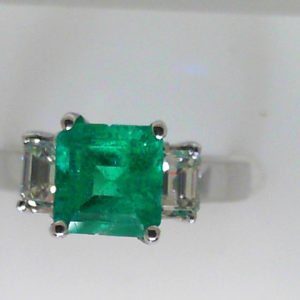 Emerald Estate Ring 
18 Karat White Green Emerald Ring With Finger Size 6.5 
 Gram Weight 5.8 
1 Center Emerald 1.38ct Shape: Emerald; Colour: Green With 2 Various Shapes Diamonds 0.30 ctw