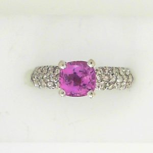 Sapphire Estate Ring
14 Karat White Pink Sapphire Ring With Finger Size 6
Gram Weight 3.7
1 Center Sapphire 1.00ct Shape: Round; Colour: Pink With 42 Round Diamonds 0.50 ctw