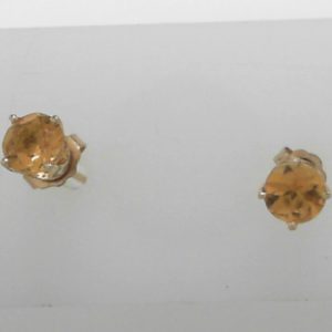 Estate Earrings With Citrines 
14 Karat Yellow Orange Citrines Earrings 
 Gram Weight 1.12 
2 Center Citrines Shape: Round; Colour: Orange