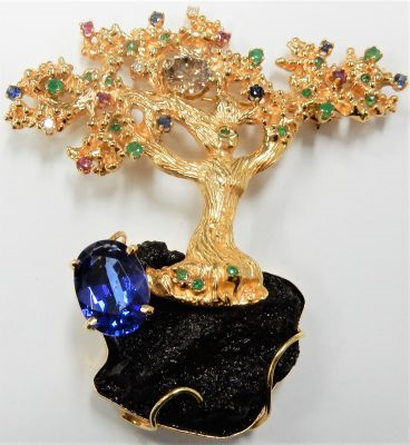 Diamond Estate Pendant
14 Karat Yellow Diamond Pendant
Gram Weight 42.06 Chain Style: No Chain
1 Center Diamond 1.50ct Shape: Round; Clarity: I1 With 1 Oval Tanzanite 5.50 ctw and 5 Round Rubies and 19 Round Emeralds and 6 Round Sapphires and 3 Roun