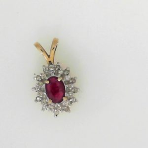Ruby Estate Pendant
14 Karat Yellow Red Ruby Pendant
Gram Weight 2.77 Chain Style: No Chain
1 Center Ruby 0.32ct Shape: Oval; Colour: Red With 24 Round Diamonds 0.20 ctw