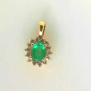 Emerald Estate Pendant
14 Karat Yellow Emerald Pendant
Gram Weight 1.9 Chain Style: No Chain
1 Center Emerald Shape: Oval With 14 Round Diamonds