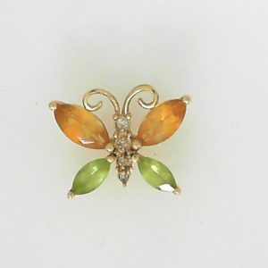 Citrines Estate Pendant
10 Karat Yellow Citrines Pendant
Gram Weight 1.6 Chain Style: No Chain
2 Center Citrines Shape: Marquise With 2 Marquise Peridot and 4 Round Diamonds