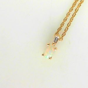 Opal Estate Pendant
14 Karat Yellow Opal Pendant
Gram Weight 1.99 Chain Style: Rope 14 Karat Yellow Length: 16in
1 Center Opal Shape: Oval With 1 Baguette Diamond