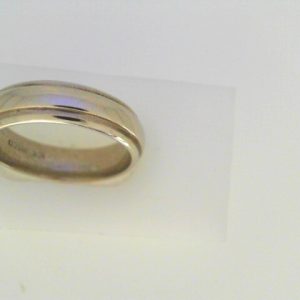 White 10 Karat Polished Band Estate Ring Width 6 mm
Size: 8.5
Gram Weight 6.7 gr