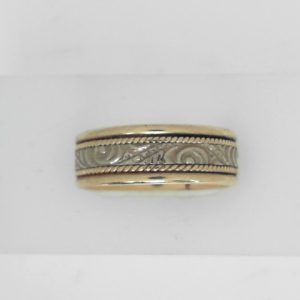 Yellow/White 10 Karat Filigree Band Estate Ring
Size: 9
Gram Weight 5.91 gr