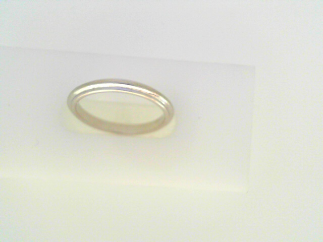White 18 Karat Polished Band Ring
Size: 6
Gram Weight 2.53 gr