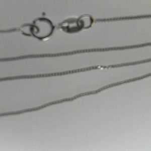 White 10 Karat Polished Curb Estate Chain Width 0.7 mm
Length 18 in
Gram Weight 0.9 gr