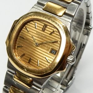 Ladies Estate Watch Patek Dress 
Vendor Style #: 4700/557826 Nautilus guartz 
27.5 18K/Stainless Steel Bracelet 
Dial:Champagne hash
Box Not Included/Papers Not Included
Condition Fair
1 Year Warranty