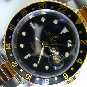 Estate Rolex Complicated Year: 1999
Vendor Style #: 16713 GMT-Master II SN: A705491 Bracelet
40mm 18K/Stainless Steel
Dial: Black Plots 
Box Not Included/Papers Not Included
Condition Fair-Good
1 Year Warranty