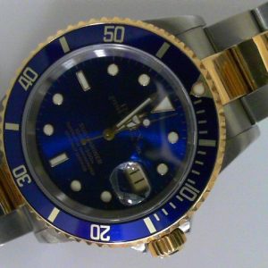 Estate Rolex Divers Year: 2000
Vendor Style #: 16613 Bluesy SN: P726332 Oyster
40mm 18K/Stainless Steel
Dial: Blue plots 
Box Not Included/Papers Not Included
Condition Very good
1 Year Warranty