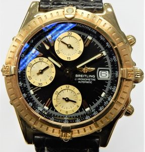 Return of Breitling K13352 SN 286665 18kt chronomat on black strap (our old stock E8432). Purchased Aug. 23, 2014 receipt 98212. With original box and papers.