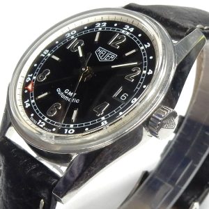 Estate Tag Heuer Complicated 
Vendor Style #: WS2113 Heuer dual time Carrera SN: AV1800 
35.7mmmm StainlessSteel
Dial: Black Arabic hash 
Box Not Included/Papers Not Included
Condition Good
1 Year Warranty