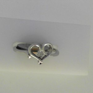 White Sterling Silver Polished Heart Ring Ring
Size: Size 6.75
