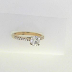 Diamond Engagement Ring 
14 Karat Yellow Engagement Ring 0.57twt
Finger Size 6 Gram Weight 2.46gram weight 
1 Center Diamond 0.47ct Shape: Round Clarity: I1 Colour: I With 16 Round Diamonds 0.10 ctw 0.57