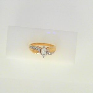 Diamond Engagement Ring 
14 Karat Yellow/White Engagement Ring 0.48twt
Finger Size 5.75 Gram Weight 3.3gram weight Width: 1.8 
1 Center Diamond 0.36ct Shape: Marquise With 12 Round Diamonds 0.12 ctw 0.48
