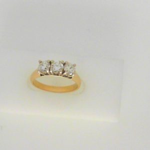 Diamond Engagement Ring 
14 Karat Yellow Engagement Ring 1.11twt
Finger Size 6.5 Gram Weight 3.89gram weight 
3 Center Diamonds Shape: Round Clarity: I1 Colour: J 1.11