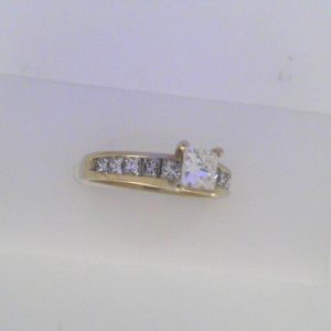 Diamond Engagement Ring 
14 Karat White Engagement Ring 1twt
Finger Size 5.75 Gram Weight 3.8gram weight Width: 2.4 
 Center Diamond Shape: Princess 1