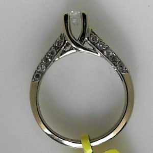 Estate Diamond Engagement Ring
14 Karat White Estate Engagement Ring
Finger Size 6.5 Gram Weight 3.78
1 Center Diamond 0.30ct Shape: Round; Clarity: I1; Colour: F/G With 20 Round Diamonds 0.30 ctw 0.6