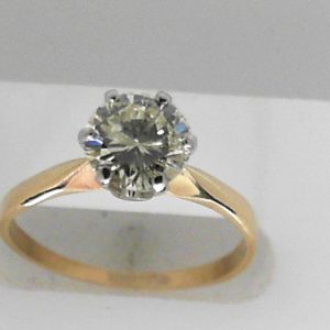 Estate Diamond Engagement Ring 
14 Karat Yellow Estate Engagement Ring 
Finger Size 8 Gram Weight 2 
1 Center Diamond 1.15ct Shape: Round; Clarity: I2; Colour: Q 1.15