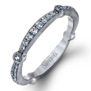 Diamond Wedding/Anniversary Ring 
18 Karat White Wedding/Anniversary Ring 
Finger Size 6 
 Center Diamond Shape: Round; Clarity: VS1; Colour: F/G 0.33