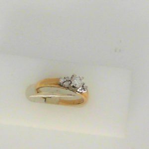 Diamond Wedding/Anniversary Ring 
14 Karat Yellow Wedding/Anniversary Ring 
Finger Size 6 
7 Center Diamonds Shape: Round 0.41