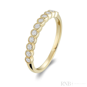 Diamond Wedding/Anniversary Ring 
14 Karat Yellow Wedding/Anniversary Ring 
Finger Size 6.5 Gram Weight 1.51 
11 Center Diamonds Shape: Round 0.26