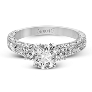 Diamond Semi-Mount Ring 
18 Karat White Ring 
Finger Size 6 
8 Center Diamonds Shape: Round; Clarity: VS1; Colour: F/G 0.16