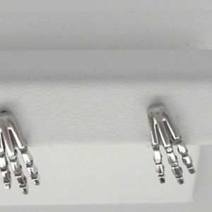 Estate Diamond Earrings 
10 Karat White Estate Diamond Earrings 
Gram Weight 2.63 
18 Center Diamonds Shape: Round 0.18