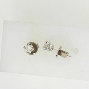 Estate Diamond Earrings 
14 Karat White Estate Diamond Earrings 
 
2 Center Diamonds 0.26ct Shape: Round; Clarity: VS; Colour: I/J 0.57