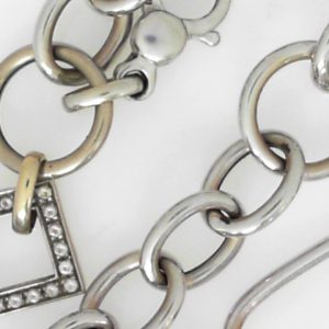 Estate Diamond Pendant/Necklace 
10 Karat White Estate Diamond Pendant 
Gram Weight 20.2 Chain Style: Fancy Link 10 Karat White 16 
20 Center Sapphires Shape: Round; Colour: White