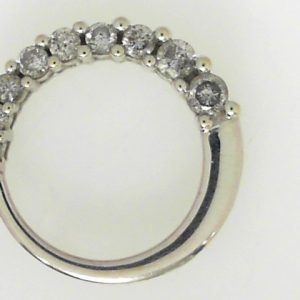 Estate Diamond Pendant/Necklace 
14 Karat White Estate Diamond Pendant 
Gram Weight 2.5 
9 Center Diamonds Shape: Round; Clarity: I2; Colour: I 0.5