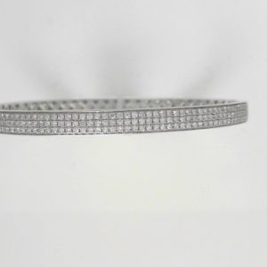 Diamond Bracelets 
14 Karat White Diamond Bracelet Width: 4.7mm 
 
150 Center Diamonds Shape: Round 0.94