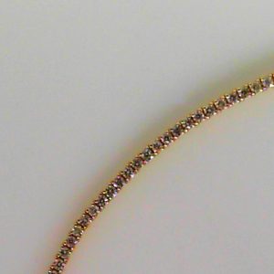 Diamond Bracelets 
14 Karat Yellow Diamond Bracelet Length: 7in 
 
80 Center Diamonds Shape: Round 1.37