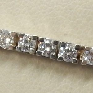 Estate Diamond Bracelet
18 Karat White Estate Diamond Bracelet Length: 7.5in Width: 3.25mm
Gram Weight 16
57 Center Diamonds Shape: Round; Clarity: SI; Colour: H 4.5