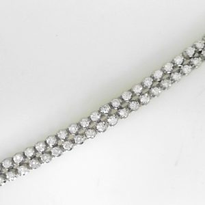 Estate Diamond Bracelet
14 Karat White Estate Diamond Bracelet Length: 7.25in
Gram Weight 12.56
132 Center Diamonds Shape: Round; Clarity: SI1; Colour: H/I 3