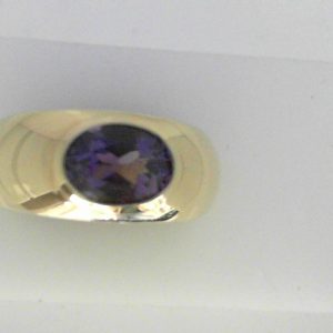 Amethyst Ring 
14 Karat Yellow Amethyst Ring With Finger Size 6.5 
Width 4.9mm Gram Weight 7.64 
1 Center Amethyst Shape: Oval