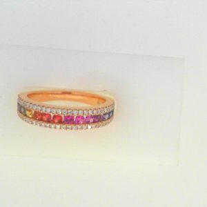 Diamonds Ring 
18 Karat Rosé Diamonds Ring With Finger Size 6.5 
 
62 Center Diamonds Shape: Round With 15 Round Sapphires 0.52 ctw