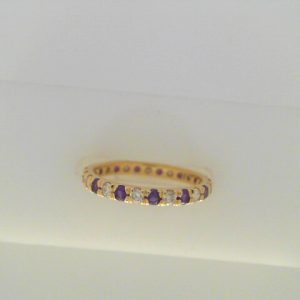 14 Karat Yellow With Finger Size 5.25 
 Gram Weight 1.4