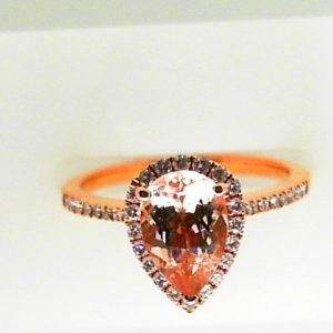 Morganite Ring 
14 Karat Rosé Morganite Ring With Finger Size 6.5 
Width 1.7mm Gram Weight 3.1 
1 Center Morganite 1.24ct Shape: Pear Round Diamond 0.21 ctw