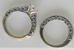 Cubic Zirconium Estate Ring 
14 Karat White Cubic Zirconium Ring 
 Gram Weight 9.6 
 Center Cubic Zirconium Shape: Round