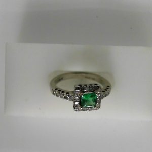Emerald Estate Ring 
14 Karat White Emerald Ring With Finger Size 5.75 
 Gram Weight 3 
1 Center Emerald 0.35ct Shape: Princess With 26 Round Diamonds 0.20 ctw