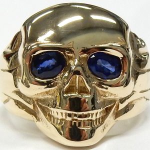 Sapphires Estate Ring
10 Karat Yellow Blue Sapphires Ring With Finger Size 11.5
Gram Weight 29.2
2 Center Sapphires Shape: Oval; Colour: Blue