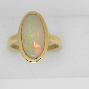 Opal Estate Ring
10 Karat Yellow Opal Ring With Finger Size 7.5
Gram Weight 4.18
1 Center Opal 2.50ct Shape: Oval