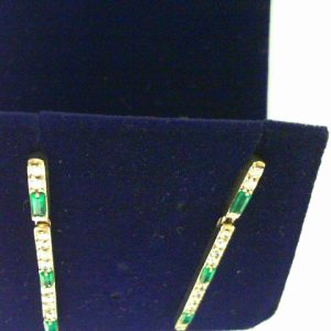 Earrings with Emeralds 
14 Karat Yellow Emeralds Earrings 
 Gram Weight 5.2 
6 Center Emeralds Shape: Baguette With 22 Round Diamonds 0.66 ctw