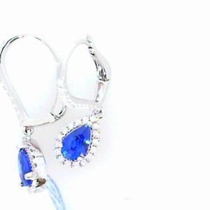 Earrings with Sapphires 
18 Karat White Sapphires Earrings 
 
2 Center Sapphires Shape: Pear With 60 Round Diamonds 0.20 ctw