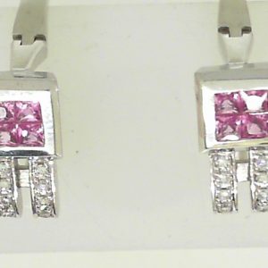 Estate Earrings With Sapphires 
18 Karat White Sapphires Earrings 
 Gram Weight 9.6 
8 Center Sapphires Shape: Princess With 16 Round Diamonds 0.16 ctw